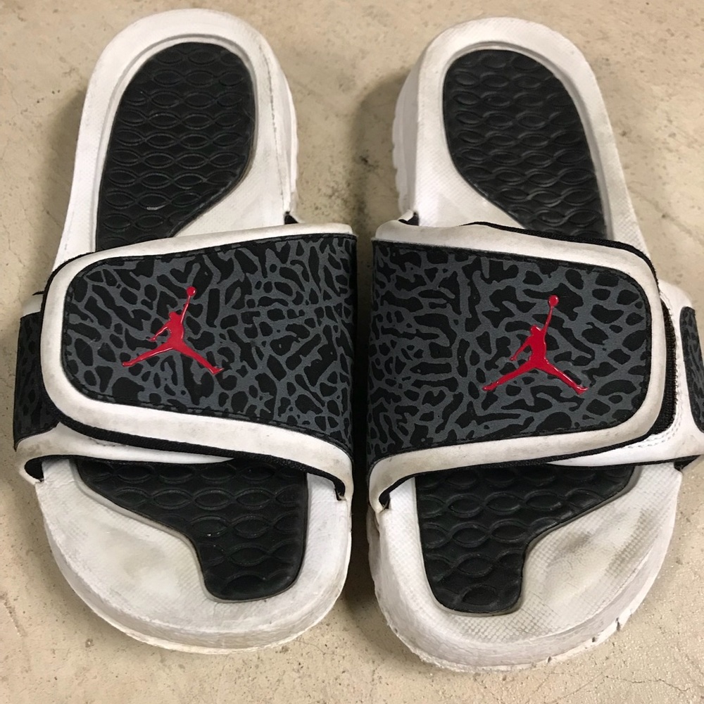 Black, white and red jordan slides